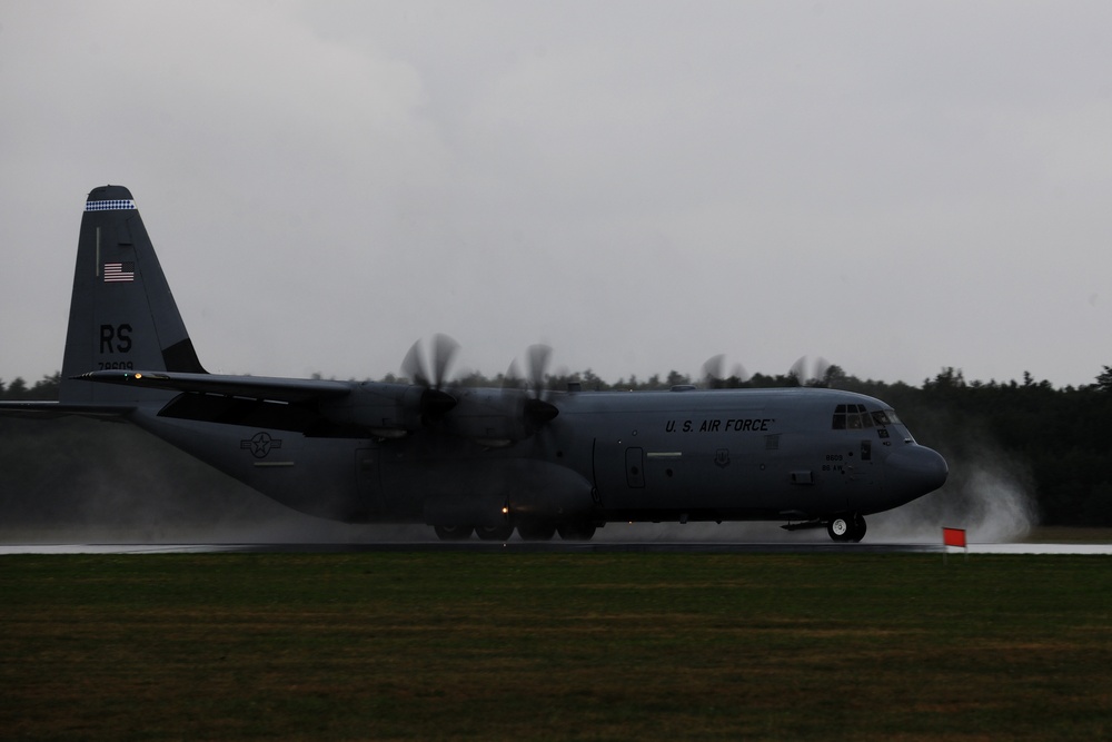 Cloudburst: C-130s train through adverse weather