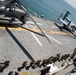 Marines prepare to debark USS Iwo Jima (LHD7)