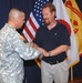 USAG-Okinawa Lt. Col. Eric Martinez hands out honors