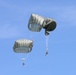 US Army paratroopers with the 173rd Airborne Brigade execute emergency procedures in response to a T-11 parachute system malfunction