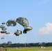 US Army paratroopers with the 173rd Airborne Brigade execute emergency procedures in response to a T-11 parachute system malfunction