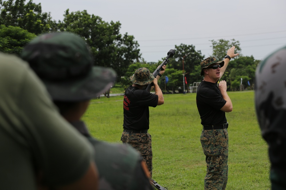NOLES participants conduct non-lethal weapons shoot