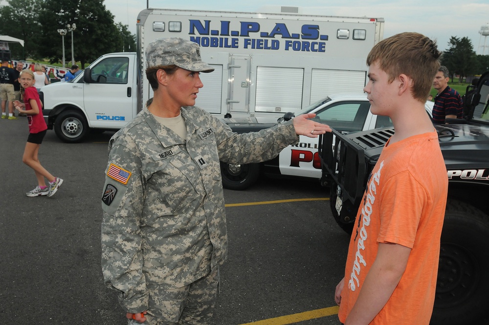 Army Reserve soldier meets local youths at National Night Out