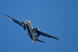 C-31A Troopship flies over AC