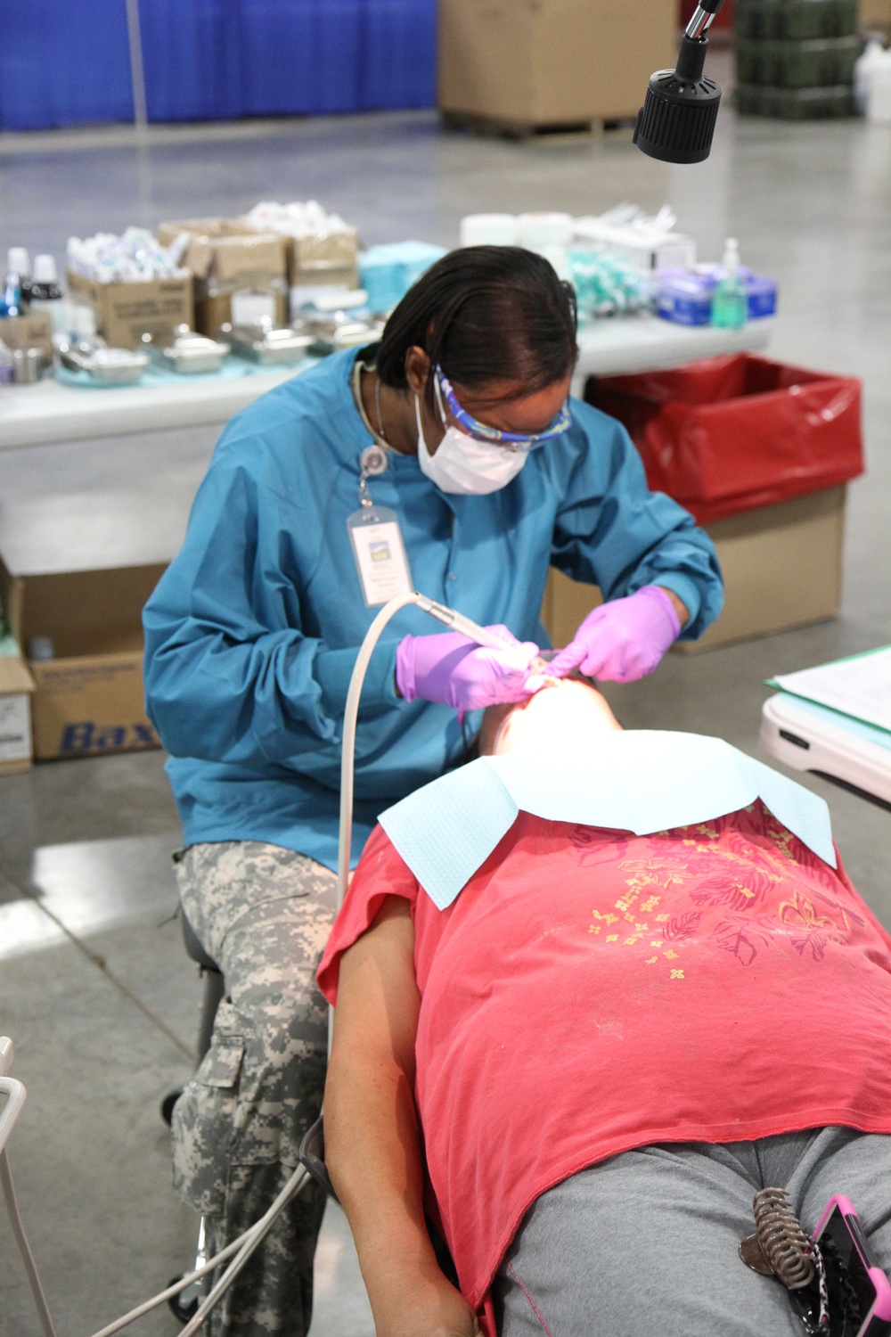 Dental hygienist provides services for community member