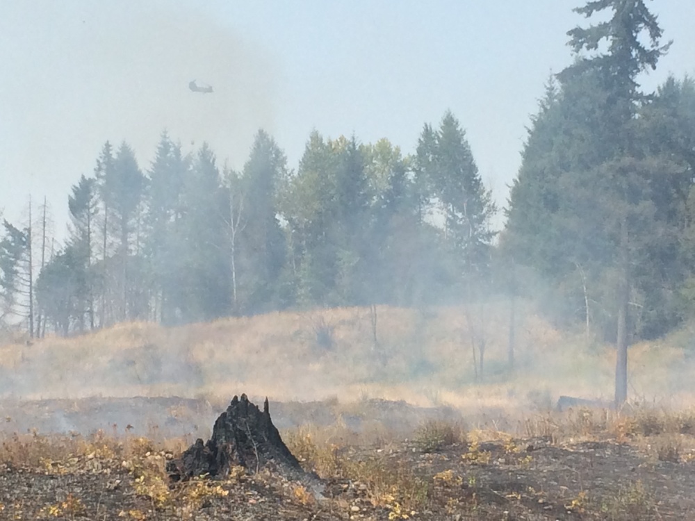 Multiple agencies work to contain JBLM wildfire