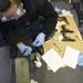 Future USS America armory sailors clean weapons