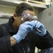 Future USS America armory sailors clean weapons