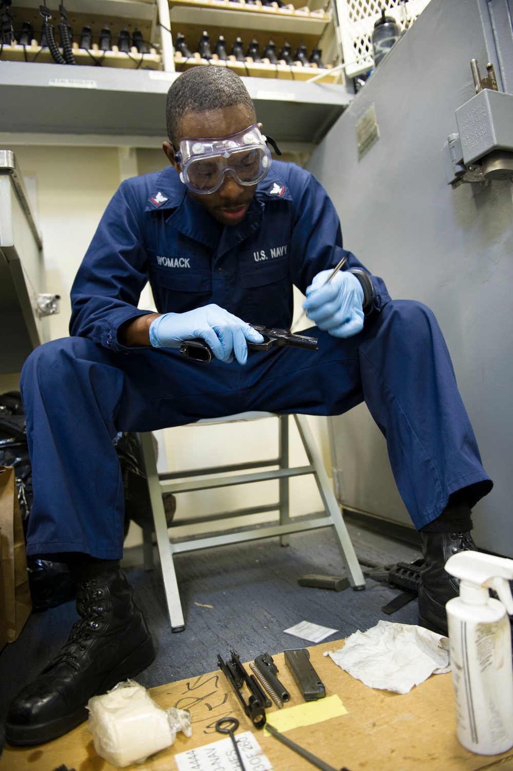 Future USS America armory sailors clean weapons