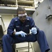 Future USS America armory sailors clean weapons