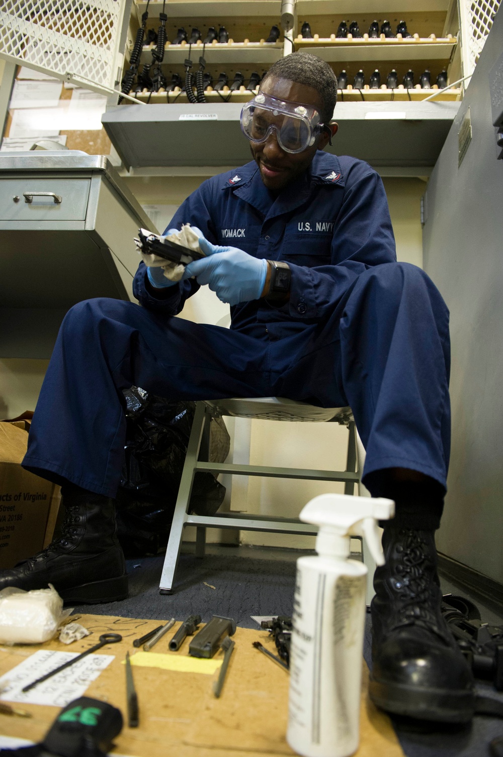 Future USS America armory sailors clean weapons