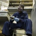 Future USS America armory sailors clean weapons
