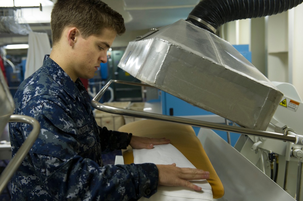 Operations aboard future USS America's laundry facilities