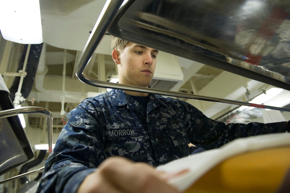 Operations aboard future USS America's laundry facilities