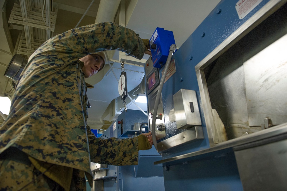 Operations aboard future USS America's laundry facilities