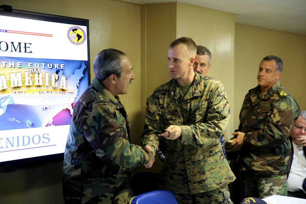 Distinguished visitors from Uruguay tour USS America