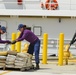 Coast Guard Cutter Paul Clark offloads an estimated 900 pounds of marijuana worth an estimated wholesale value of nearly $800,000