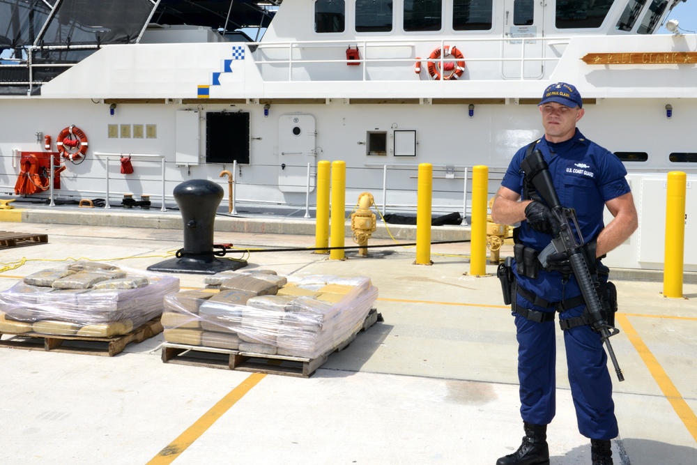 Coast Guard Cutter Paul Clark offloads an estimated 900 pounds of marijuana worth an estimated wholesale value of nearly $800,000