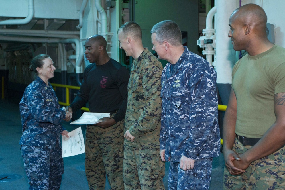 Sailors earn MCMAP belt aboard USS America