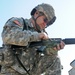 Army Reserve soldier adjusts his weapon sites at the zero range