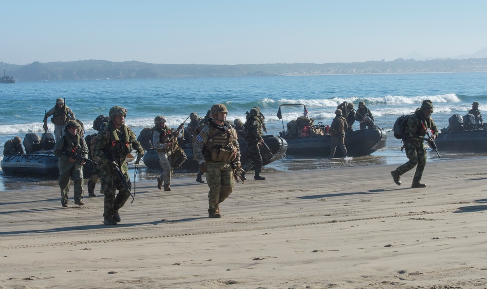 Marines rush the beach during a training evolution as part of Partnership of the Americas 2014