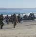 Marines rush the beach during a training evolution as part of Partnership of the Americas 2014