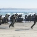 Marines rush the beach during a training evolution as part of Partnership of the Americas 2014
