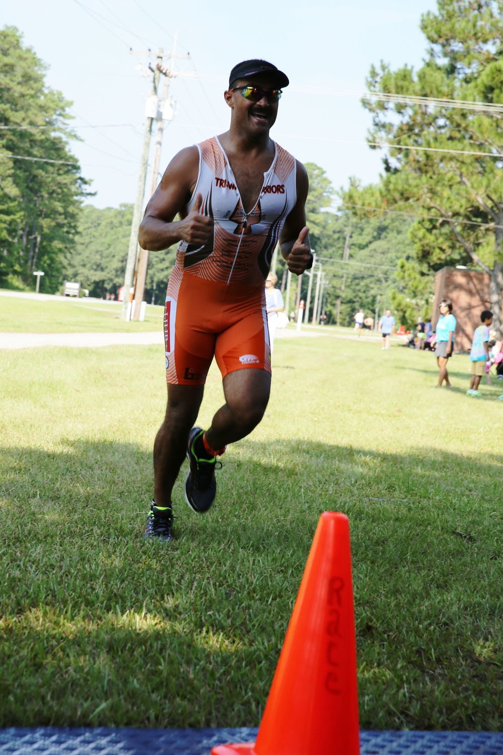 Competitors swim, bike, run to finish line