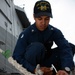 USS Green Bay Sailors prepare cable for magnetic treatment