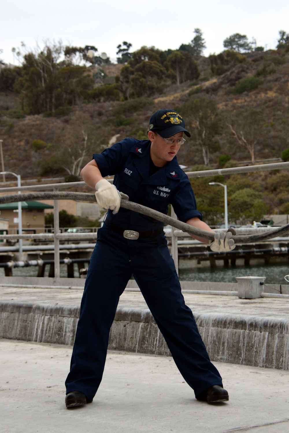 USS Green Bay Sailors prepare cable for magnetic treatment