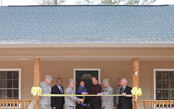 Ribbon cutting ceremony to open East Beach and Singing Pines cabins