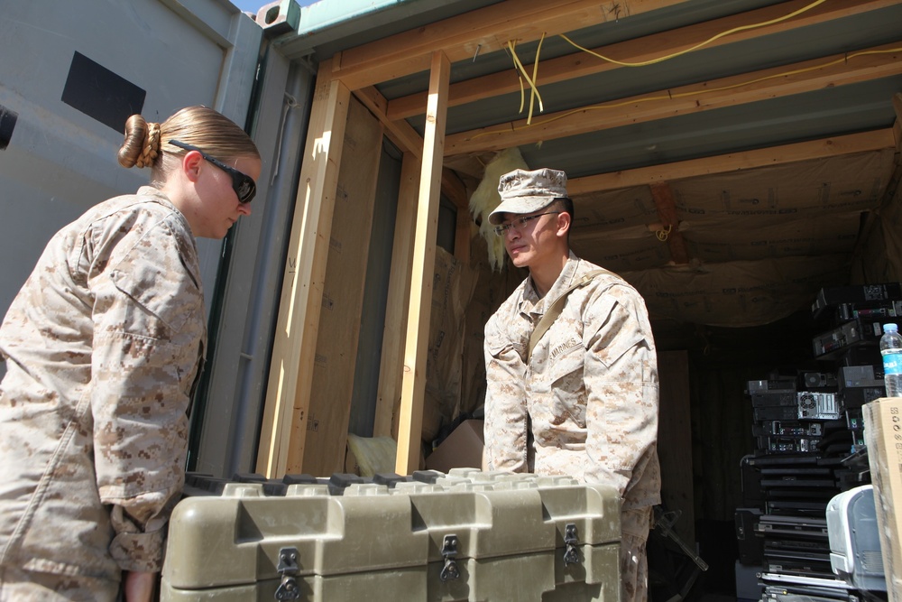 Supply Marines with Marine Expeditionary Brigade - Afghanistan retrograde excess gear aboard Camp Leatherneck, Afghanistan