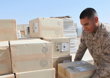 Supply Marines with Marine Expeditionary Brigade - Afghanistan retrograde excess gear aboard Camp Leatherneck, Afghanistan
