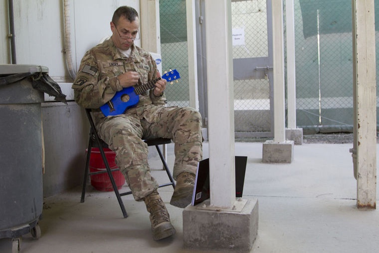 Colonel continues to play ukulele