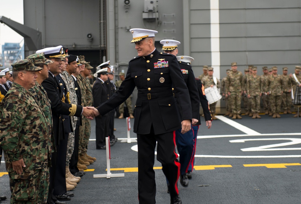 Brig. Gen. David Coffman, commander Marine Forces South, greets representatives from partner nations who participated in Partnership of the Americas 2014 at the Closing Ceremony aboard the Chilean ship LSDH Sargento Aldea Aug. 22, 2014