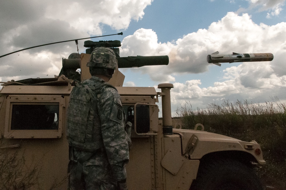 Firing a TOW missile system from a Humvee