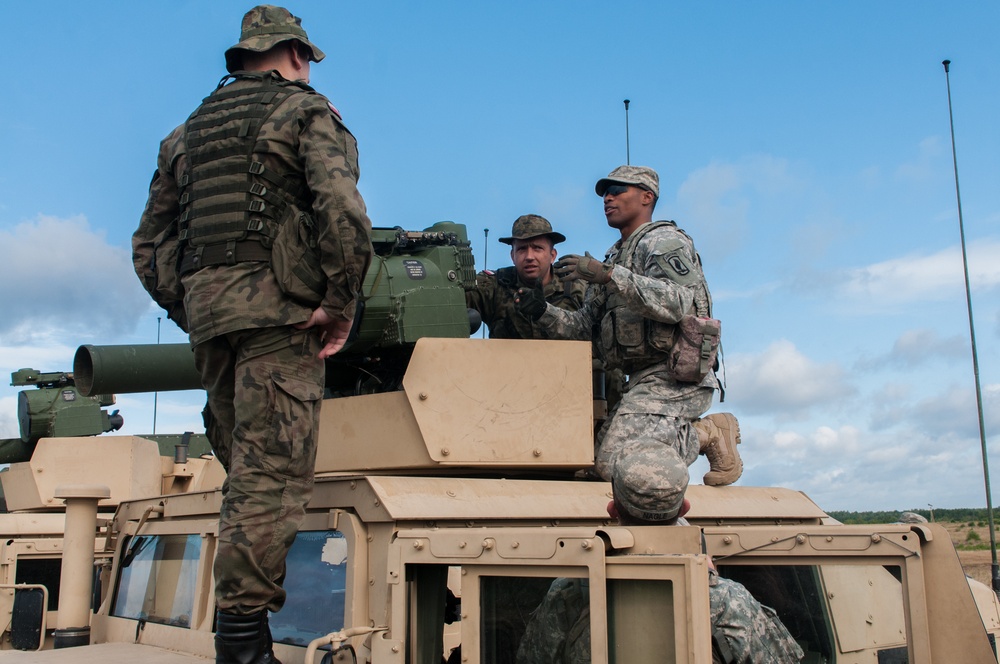 Preparing to shoot a TOW missile system