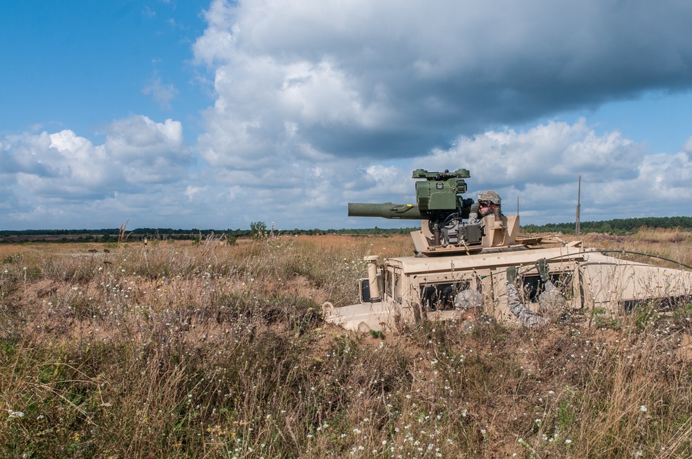 Preparing to shoot a TOW missile system