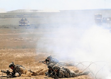 Engineers place breaching charge