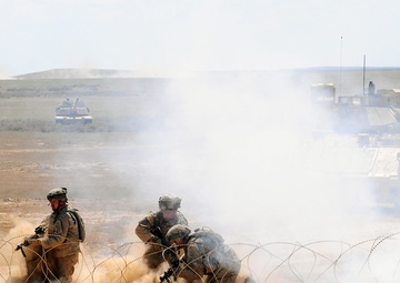 Engineers place breaching charge