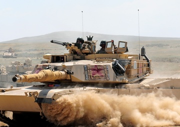 Abrams kicks up dust