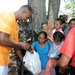 US service members volunteer to carry food, supplies to remote Honduran village