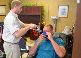Soldier uses breathing device during testing