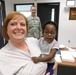 Child receives glasses at no cost during IRT exercise