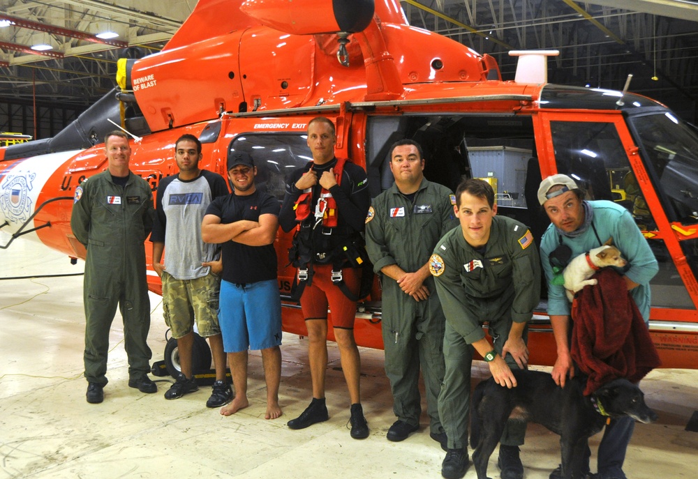 Helicopter crew transports 3 stranded campers, 2 dogs