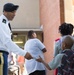 Soldiers welcome students back to school