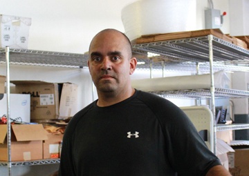 Wounded warrior helps with inventory at Hawaii warehouse