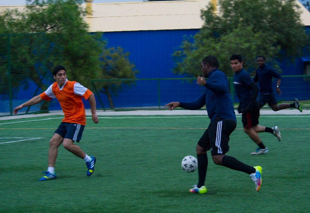 USS America sailors play soccer with Chilean navy soccer team