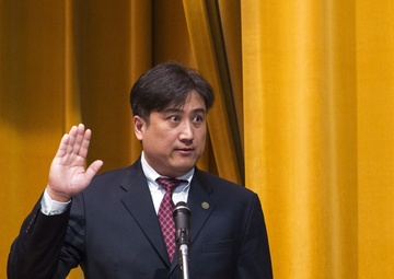 Raise your right hand: Service members, dependents swear Oath of Allegiance