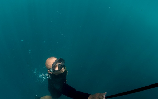 US Navy divers dive an underwater wreck with Colombian divers as part of Southern Partnership Station '14